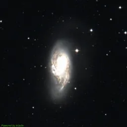 M66 — composite color image